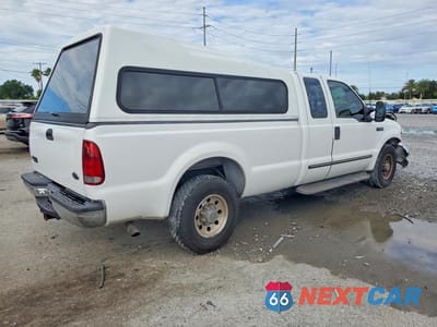 Trzecie zdjęcie samochodu z tyłu: 2000 FORD F250 SUPER DUTY VIN:1FTNX20L4YED09511 - miniatura