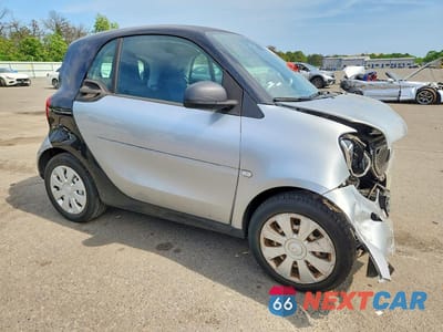 Czwarte zdjęcie samochodu z boku: 2016 SMART FORTWO VIN:WMEFJ5DA4GK057339 - miniatura