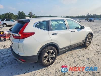Trzecie zdjęcie samochodu z tyłu: 2018 HONDA CR-V LX VIN:2HKRW5H39JH418157 - miniatura