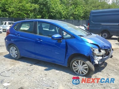 Czwarte zdjęcie samochodu z boku: 2016 HONDA FIT LX VIN:JHMGK5H57GS007174 - miniatura