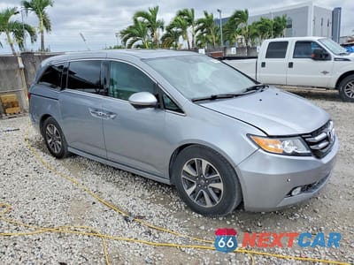 Czwarte zdjęcie samochodu z boku: 2016 HONDA ODYSSEY TOURING VIN:5FNRL5H95GB033196 - miniatura