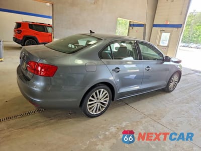 Trzecie zdjęcie samochodu z tyłu: 2011 VOLKSWAGEN JETTA SEL VIN:3VWLX7AJ4BM309217 - miniatura