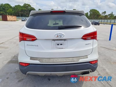 Zdjęcie 6 z 13 samochodu: 2013 HYUNDAI SANTA FE SPORT 2.4L VIN:5XYZU3LB9DG101080 - miniatura