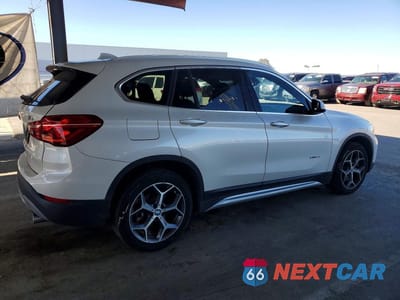 Trzecie zdjęcie samochodu z tyłu: 2018 BMW X1 SDRIVE28I VIN:WBXHU7C37J5H40662 - miniatura