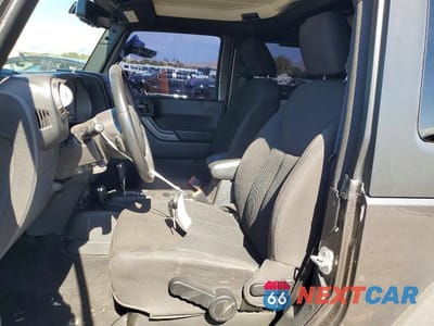 Zdjęcie 7 z 13 samochodu: 2017 JEEP WRANGLER SPORT VIN:1C4AJWAG4HL640044 - miniatura