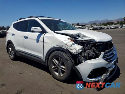 Czwarte zdjęcie samochodu z boku: 2018 HYUNDAI SANTA FE SPORT 2.4L VIN:5NMZU3LB3JH052816 - miniatura