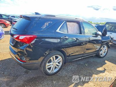 Trzecie zdjęcie samochodu z tyłu: 2018 CHEVROLET EQUINOX PREMIER VIN:2GNAXMEV7J6343559 - miniatura