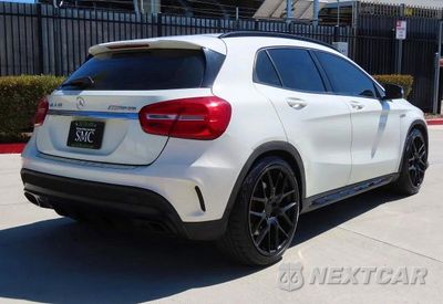 Trzecie zdjęcie samochodu z tyłu: 2015 MERCEDES-BENZ GLA 45 AMG VIN:WDDTG5CBXFJ077471 - miniatura