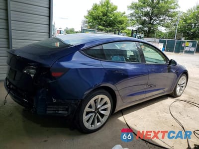 Trzecie zdjęcie samochodu z tyłu: 2022 TESLA MODEL 3 VIN:5YJ3E1EA7NF370781 - miniatura