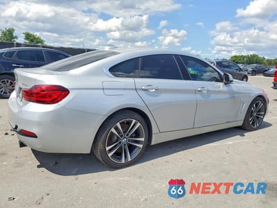 Trzecie zdjęcie samochodu z tyłu: 2020 BMW 440I GRAN COUPE VIN:WBA4J5C04LCD24580 - miniatura