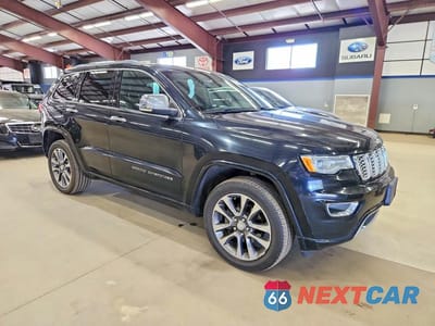 Czwarte zdjęcie samochodu z boku: 2018 JEEP GRAND CHEROKEE OVERLAND VIN:1C4RJFCG3JC387871 - miniatura