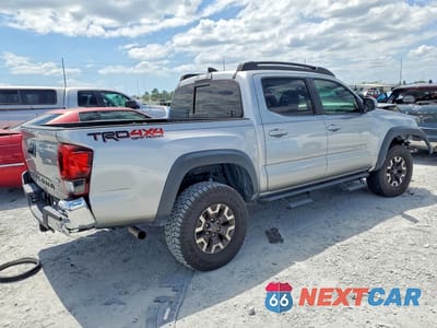 Trzecie zdjęcie samochodu z tyłu: 2018 TOYOTA TACOMA TRD OFF-ROAD VIN:5TFCZ5AN0JX162052 - miniatura