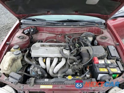 Zdjęcie 11 z 12 samochodu: 1999 TOYOTA COROLLA VE VIN:1NXBR12E1XZ277848 - miniatura