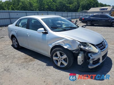 Czwarte zdjęcie samochodu z boku: 2009 VOLKSWAGEN JETTA SE VIN:3VWRZ71KX9M170640 - miniatura