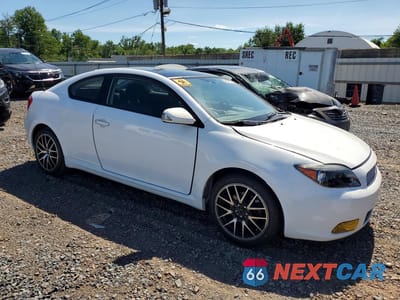 Czwarte zdjęcie samochodu z boku: 2006 SCION TC BASE VIN:JTKDE167X60083841 - miniatura