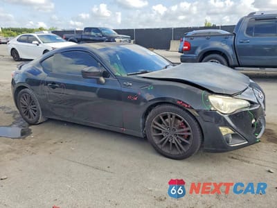 Czwarte zdjęcie samochodu z boku: 2015 SCION FR-S BASE VIN:JF1ZNAA13F9700059 - miniatura
