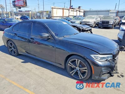 Czwarte zdjęcie samochodu z boku: 2021 BMW 330XI VIN:3MW5R7J04M8B86718 - miniatura