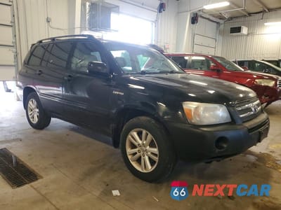 Czwarte zdjęcie samochodu z boku: 2006 TOYOTA HIGHLANDER HYBRID VIN:JTEEW21A260015109 - miniatura