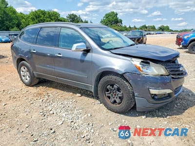 Czwarte zdjęcie samochodu z boku: 2014 CHEVROLET TRAVERSE LS VIN:1GNKRFED3EJ254615 - miniatura