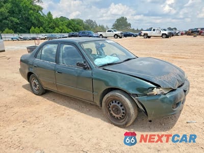 Czwarte zdjęcie samochodu z boku: 2001 TOYOTA COROLLA LE VIN:1NXBR12E21Z484577 - miniatura