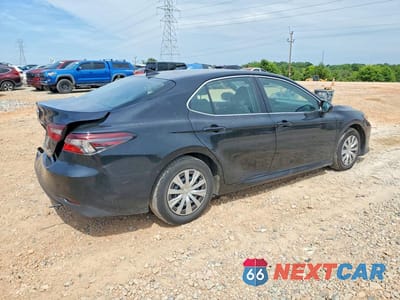 Trzecie zdjęcie samochodu z tyłu: 2023 TOYOTA CAMRY LE VIN:4T1C31AK7PU606209 - miniatura