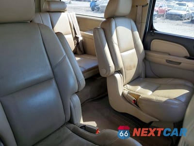 Zdjęcie 10 z 12 samochodu: 2011 GMC YUKON XL DENALI VIN:1GKS2MEF5BR128339 - miniatura