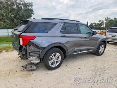 Trzecie zdjęcie samochodu z tyłu: 2021 FORD EXPLORER XLT VIN:1FMSK8DHXMGB86950 - miniatura