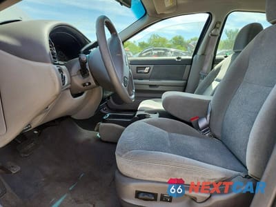 Zdjęcie 7 z 12 samochodu: 2000 FORD TAURUS SE VIN:1FAFP53U5YG259500 - miniatura