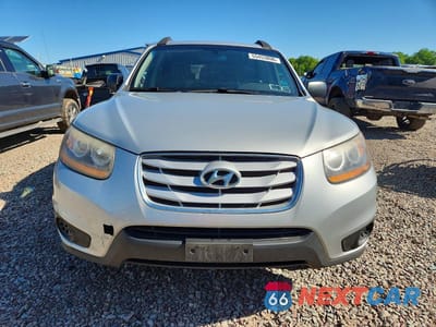 Piąte zdjęcie samochodu w środku: 2010 HYUNDAI SANTA FE GLS VIN:5NMSG3AB6AH414438 - miniatura
