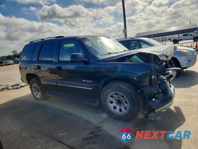 Czwarte zdjęcie samochodu z boku: 2003 CHEVROLET TAHOE C1500 VIN:1GNEC13Z83J346039 - miniatura