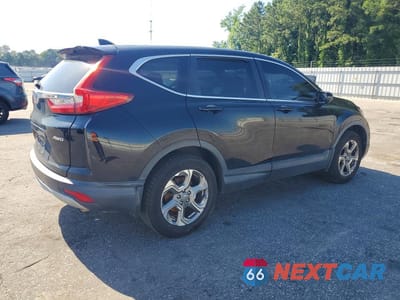 Trzecie zdjęcie samochodu z tyłu: 2018 HONDA CR-V EXL VIN:2HKRW2H82JH667636 - miniatura
