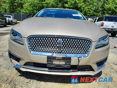 Piąte zdjęcie samochodu w środku: 2017 LINCOLN MKZ SELECT VIN:3LN6L5C94HR608068 - miniatura