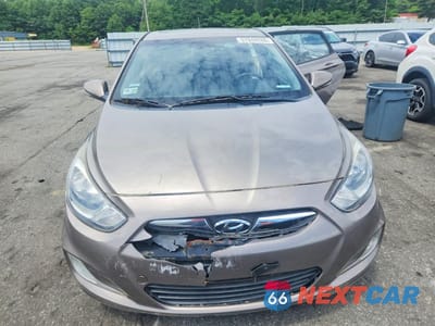 Piąte zdjęcie samochodu w środku: 2013 HYUNDAI ACCENT SE VIN:KMHCU5AE1DU104077 - miniatura