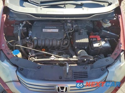 Zdjęcie 11 z 12 samochodu: 2010 HONDA INSIGHT EX VIN:JHMZE2H74AS034601 - miniatura
