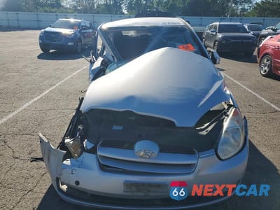 Piąte zdjęcie samochodu w środku: 2009 HYUNDAI ACCENT SE VIN:KMHCN36C39U130891 - miniatura