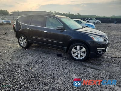 Czwarte zdjęcie samochodu z boku: 2015 CHEVROLET TRAVERSE LTZ VIN:1GNKRJKD5FJ187136 - miniatura