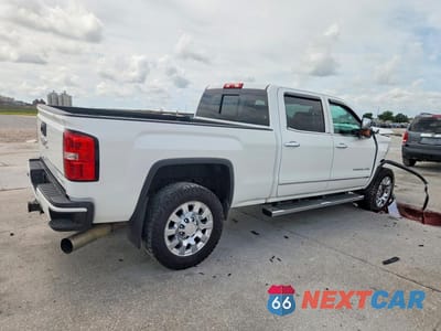 Trzecie zdjęcie samochodu z tyłu: 2015 GMC SIERRA K2500 DENALI VIN:1GT120E84FF586043 - miniatura