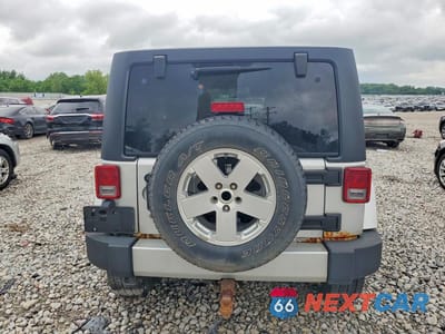 Zdjęcie 6 z 13 samochodu: 2012 JEEP WRANGLER UNLIMITED SAHARA VIN:1C4BJWEG7CL150012 - miniatura
