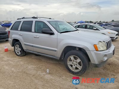 Czwarte zdjęcie samochodu z boku: 2007 JEEP GRAND CHEROKEE LAREDO VIN:1J8HS48PX7C595480 - miniatura
