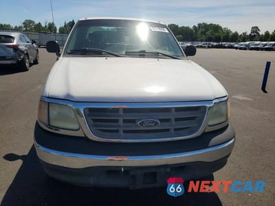 Piąte zdjęcie samochodu w środku: 2002 FORD F-150 VIN:1FTRX17W02NB82565 - miniatura