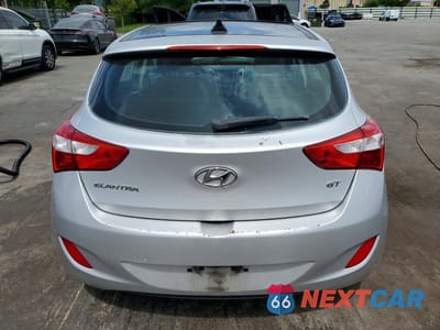 Zdjęcie 6 z 12 samochodu: 2013 HYUNDAI ELANTRA GT BASE VIN:KMHD35LE9DU049253 - miniatura