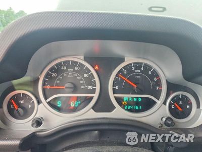 Zdjęcie 9 z 13 samochodu: 2010 JEEP WRANGLER SPORT VIN:1J4AA2D18AL157527 - miniatura