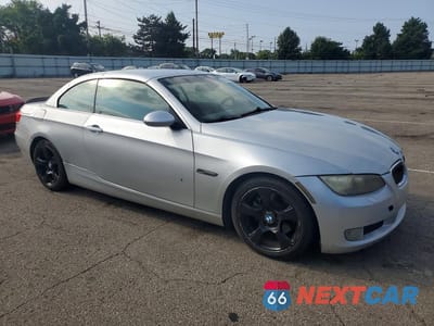 Czwarte zdjęcie samochodu z boku: 2009 BMW 328 I SULEV VIN:WBAWR33549P461034 - miniatura