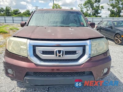 Piąte zdjęcie samochodu w środku: 2011 HONDA PILOT EXL VIN:5FNYF3H65BB047606 - miniatura