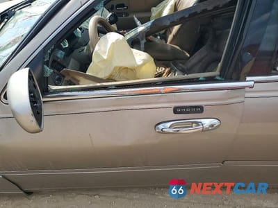 Zdjęcie 7 z 12 samochodu: 1999 LINCOLN TOWN CAR SIGNATURE VIN:1LNHM82W6XY686222 - miniatura