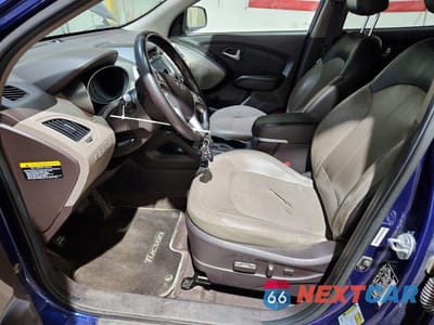 Zdjęcie 7 z 13 samochodu: 2010 HYUNDAI TUCSON LIMITED VIN:KM8JUCAC5AU024402 - miniatura