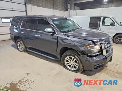 Czwarte zdjęcie samochodu z boku: 2016 CHEVROLET TAHOE K1500 LS VIN:1GNSKAKC4GR258941 - miniatura