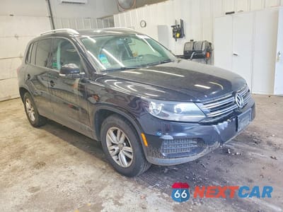 Czwarte zdjęcie samochodu z boku: 2014 VOLKSWAGEN TIGUAN S VIN:WVGBV3AX2EW596073 - miniatura