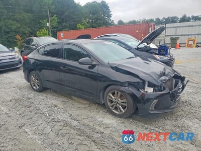 Czwarte zdjęcie samochodu z boku: 2018 HYUNDAI ELANTRA VALUE EDITION VIN:5NPD84LF3JH363804 - miniatura