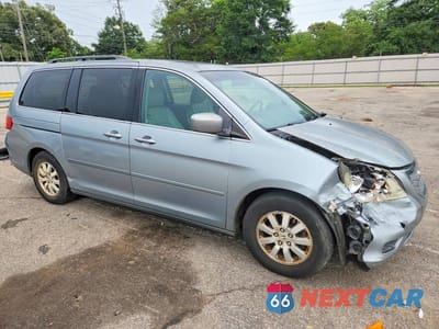 Czwarte zdjęcie samochodu z boku: 2010 HONDA ODYSSEY EXL VIN:5FNRL3H72AB044070 - miniatura
